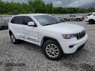 2021 Jeep Grand Cherokee Laredo E with VIN 1C4RJEAG4MC548990, listed as a Copart auction lot 55638235 with 54,771 mi miles and Salvage title. Bid and sale history available at DreamBid. Image 4.