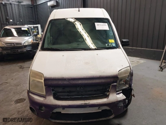 2011 Ford Transit Connect XLT with VIN NM0LS7BN0BT049898, listed as a IAAI auction lot 40714359 with 124,045 mi miles. Bid and sale history available at carsss.com. Image 12.