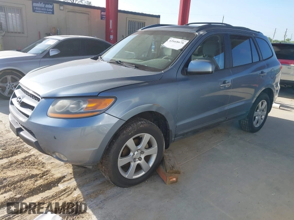 2009 Hyundai Santa Fe SE with VIN 5NMSH73EX9H318027, listed as a IAAI auction lot 42668676 with 185,610 mi miles and . Bid and sale history available at DreamBid. Image 2.