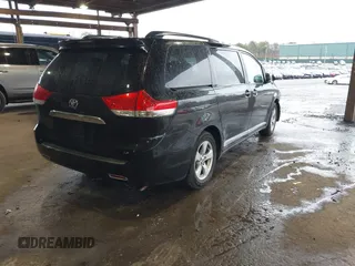 2014 Toyota Sienna LE AAS with VIN 5TDKK3DC7ES426751, listed as a IAAI auction lot 41975870 with 100,000 mi miles and . Bid and sale history available at carsss.com. Image 4.