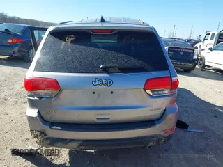 2014 Jeep Grand Cherokee Laredo with VIN 1C4RJFAG0EC289647, listed as a IAAI auction lot 41883914 with 176,501 mi miles and . Bid and sale history available at DreamBid. Image 16.