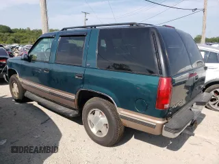1998 GMC Yukon with VIN 1GKEK13RXWJ723572, listed as a Copart auction lot 65987314 with 237,503 mi miles and Salvage Title. Bid and sale history available at carsss.com. Image 2.