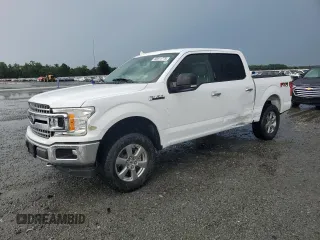 2018 Ford F-150 XL with VIN 1FTEW1E53JKD77779, listed as a Copart auction lot 60811775 with 125,740 mi miles and Salvage title. Bid and sale history available at DreamBid. Image 1.