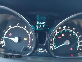 2014 Ford Fiesta SE z VIN 3FADP4BJ3EM183267, wystawiony jako IAAI lot #42058257 z przebiegiem 57 872 mil mil oraz . Historia ofert i sprzedaży dostępna na DreamBid. Obrazek 7.