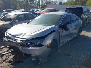 2019 Honda Civic Sport with VIN 19XFC2F88KE034868, listed as a IAAI auction lot 41913004 with 60,599 mi miles and . Bid and sale history available at DreamBid. Image 18.