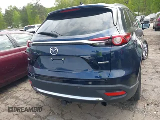 2021 Mazda CX-9 Carbon Edition with VIN JM3TCADY1M0516505, listed as a IAAI auction lot 42016644 with 50,900 mi miles and . Bid and sale history available at carsss.com. Image 17.