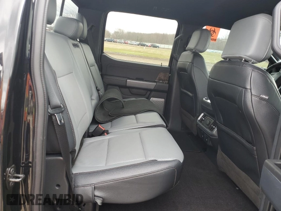 2022 Ford F-150 Lightning Pro z VIN 1FTVW1EL6NWG15167, wystawiony jako Copart lot #50514135 z przebiegiem 18 912 mil mil oraz Szkody całkowita. Historia ofert i sprzedaży dostępna na DreamBid. Obrazek 10.
