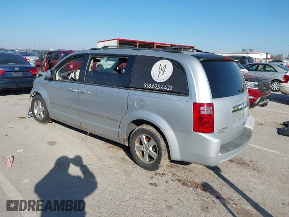 2010 Dodge Grand Caravan SXT with VIN 2D4RN5D17AR154594, listed as a IAAI auction lot 41751767 with Not Provided miles and . Bid and sale history available at DreamBid. Image 3.