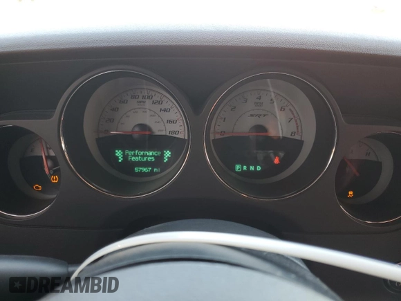 2014 Dodge Challenger SRT-8 z VIN 2C3CDYCJ3EH201998, wystawiony jako Copart lot #53308065 z przebiegiem 57 967 mil mil oraz Szkoda całkowita • Salvage title. Historia ofert i sprzedaży dostępna na DreamBid. Obrazek 9.
