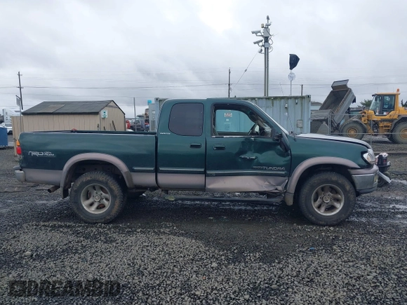 2000 Toyota Tundra Limited with VIN 5TBBT4812YS031675, listed as a IAAI auction lot 41626727 with 257,195 mi miles. Bid and sale history available at carsss.com. Image 13.