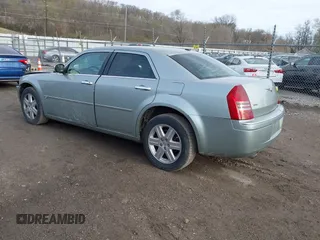 2006 Chrysler 300 C with VIN 2C3LK63H56H423161, listed as a IAAI auction lot 41947286 with 227,092 mi miles and . Bid and sale history available at carsss.com. Image 3.