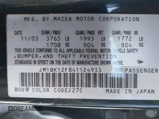 2004 Mazda 3 i with VIN JM1BK12F841124933, listed as a IAAI auction lot 41831640 with 160,980 mi miles and . Bid and sale history available at DreamBid. Image 9.