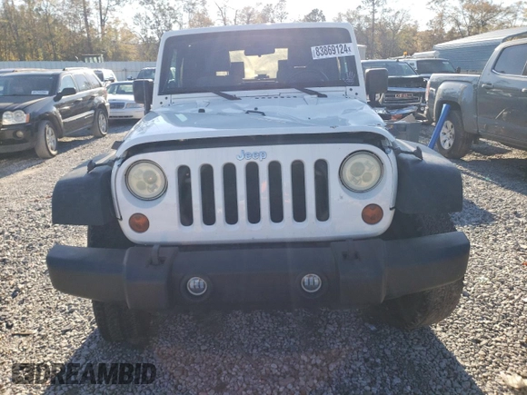 2010 Jeep Wrangler Rubicon with VIN 1J4BA6D17AL132002, listed as a Copart auction lot 83869124 with 183,507 mi miles and Salvage title. Bid and sale history available at DreamBid. Image 5.