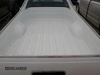 1984 Chevrolet El Camino z VIN 1GCCW80H7ER173291, wystawiony jako Copart lot #76606244 z przebiegiem Nie podano mil oraz Szkoda całkowita • Salvage title. Historia ofert i sprzedaży dostępna na DreamBid. Obrazek 10.