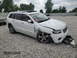2015 Jeep Grand Cherokee Overland z VIN 1C4RJFCG8FC726437, wystawiony jako Copart lot #63671265 z przebiegiem 158 452 mil mil oraz Czysty tytuł • Clean title. Historia ofert i sprzedaży dostępna na DreamBid. Obrazek 4.