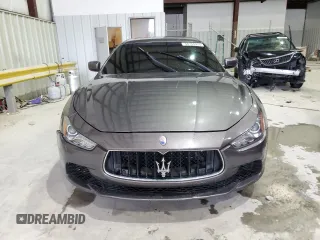2015 Maserati Ghibli z VIN ZAM57XSA2F1130506, wystawiony jako Copart lot #58704905 z przebiegiem Nie podano mil oraz Szkoda całkowita • Salvage title. Historia ofert i sprzedaży dostępna na DreamBid. Obrazek 5.