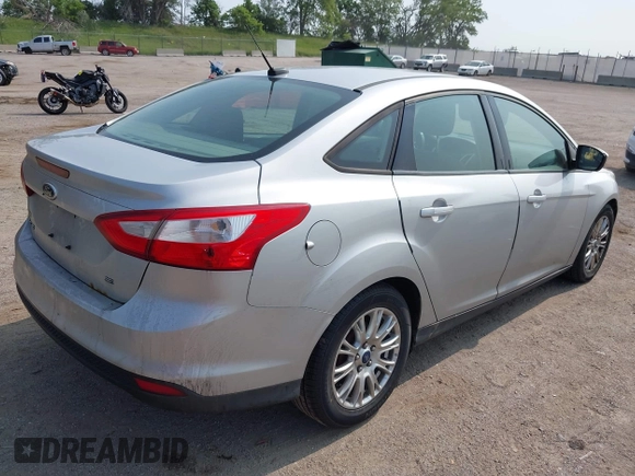 2012 Ford Focus SE with VIN 1FAHP3F22CL115653, listed as a IAAI auction lot 42380304 with 192,639 mi miles and . Bid and sale history available at DreamBid. Image 4.