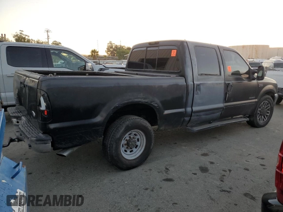 2003 Ford Super Duty F-250 XL with VIN 1FTNW20F03EA23645, listed as a Copart auction lot 82768964 with 0 mi miles and Salvage Title. Bid and sale history available at carsss.com. Image 3.