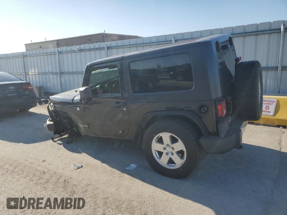 2010 Jeep Wrangler Sahara z VIN 1J4AA5D1XAL227305, wystawiony jako Copart lot #70165554 z przebiegiem Nie podano mil oraz Szkoda całkowita • Salvage title. Historia ofert i sprzedaży dostępna na DreamBid. Obrazek 2.