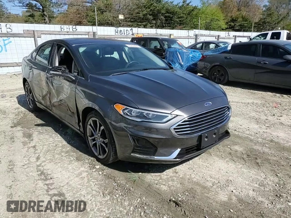 2020 Ford Fusion SEL z VIN 3FA6P0CD7LR196193, wystawiony jako Copart lot #53254465 z przebiegiem 79 944 mil mil oraz Szkoda całkowita • Salvage title. Historia ofert i sprzedaży dostępna na DreamBid. Obrazek 13.