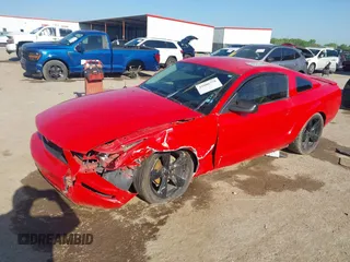 2007 Ford Mustang Deluxe z VIN 1ZVFT80N875370716, wystawiony jako IAAI lot #42006779 z przebiegiem 149 895 mil mil oraz . Historia ofert i sprzedaży dostępna na DreamBid. Obrazek 17.