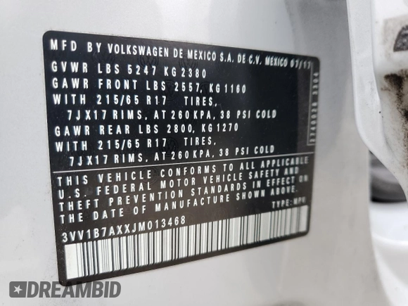 2018 Volkswagen Tiguan S with VIN 3VV1B7AXXJM013468, listed as a Copart auction lot 58371875 with 61,464 mi miles and Salvage title. Bid and sale history available at DreamBid. Image 14.
