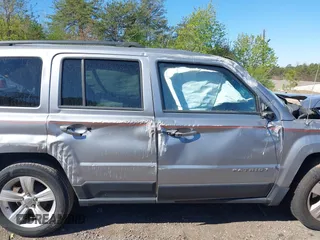 2017 Jeep Patriot High Altitude with VIN 1C4NJPFA4HD148863, listed as a IAAI auction lot 41822279 with 102,519 mi miles and . Bid and sale history available at carsss.com. Image 13.