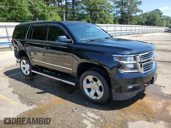 2017 Chevrolet Tahoe LT with VIN 1GNSCBKC2HR312256, listed as a Copart auction lot 55736935 with 175,072 mi miles and Salvage title. Bid and sale history available at DreamBid. Image 4.