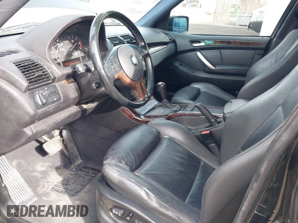 2001 BMW X5 4.4i with VIN WBAFB33531LH22723, listed as a IAAI auction lot 41834755 with 184,082 mi miles. Bid and sale history available at carsss.com. Image 5.