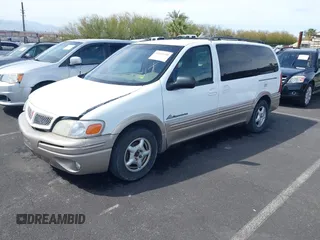 2002 Pontiac Montana with VIN 1GMDX03EX2D120237, listed as a IAAI auction lot 41858448 with 128,022 mi miles and . Bid and sale history available at DreamBid. Image 2.