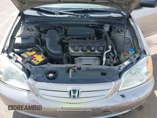 2001 Honda Civic LX with VIN 2HGES16511H554168, listed as a IAAI auction lot 42009621 with 163,801 mi miles. Bid and sale history available at carsss.com. Image 10.
