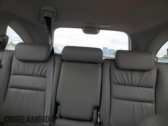 2007 Honda CR-V EX-L z VIN JHLRE48767C107065, wystawiony jako Copart lot #57261965 z przebiegiem 160 752 mil mil oraz Szkoda całkowita • Salvage title. Historia ofert i sprzedaży dostępna na DreamBid. Obrazek 10.