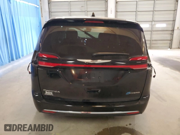 2024 Chrysler Pacifica Hybrid Select z VIN 2C4RC1S77RR158336, wystawiony jako Copart lot #54831295 z przebiegiem 30 950 mil mil oraz Czysty tytuł • Clean title. Historia ofert i sprzedaży dostępna na DreamBid. Obrazek 6.