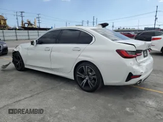 2022 BMW 3 Series 330i with VIN 3MW5R1J08N8C23042, listed as a Copart auction lot 56992485 with 43,693 mi miles and Salvage title. Bid and sale history available at DreamBid. Image 2.