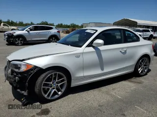 2013 BMW 1 Series 128i with VIN WBAUP9C58DVS95444, listed as a Copart auction lot 61105005 with 11,632 mi miles and Salvage title. Bid and sale history available at DreamBid. Image 1.