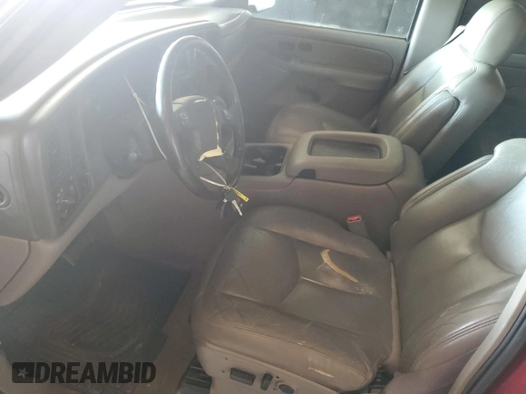 2004 Chevrolet Tahoe LT with VIN 1GNEC13Z84R222839, listed as a Copart auction lot 62787765 with 171,066 mi miles and Salvage title. Bid and sale history available at DreamBid. Image 7.