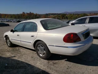 2002 Lincoln Continental with VIN 1LNHM97V62Y643532, listed as a Copart auction lot 76015984 with 154,374 mi miles and Salvage Title. Bid and sale history available at carsss.com. Image 2.
