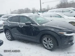 2023 Mazda CX-30 S Preferred z VIN 3MVDMBCM5PM538960, wystawiony jako IAAI lot #41273300 z przebiegiem 22 846 mil mil oraz . Historia ofert i sprzedaży dostępna na DreamBid. Obrazek 13.