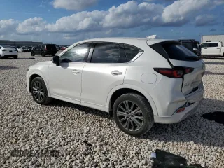 2024 Mazda CX-5 2.5 Turbo Signature with VIN JM3KFBXY7R0518304, listed as a Copart auction lot 42788985 with 8,593 mi miles and Salvage Title. Bid and sale history available at carsss.com. Image 2.