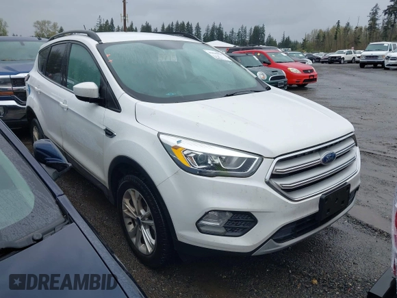 2018 Ford Escape SEL with VIN 1FMCU9HD5JUA42764, listed as a IAAI auction lot 41869026 with 84,958 mi miles. Bid and sale history available at carsss.com. Image 1.