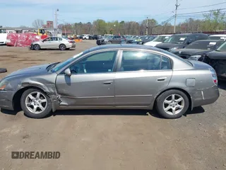 2006 Nissan Altima S with VIN 1N4AL11E76N414440, listed as a IAAI auction lot 42102394 with 153,079 mi miles and . Bid and sale history available at DreamBid. Image 14.