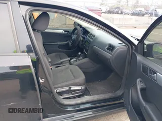 2015 Volkswagen Jetta Sedan 1.8T SE with VIN 3VWD17AJ0FM218263, listed as a IAAI auction lot 42083017 with 194,850 mi miles. Bid and sale history available at carsss.com. Image 5.