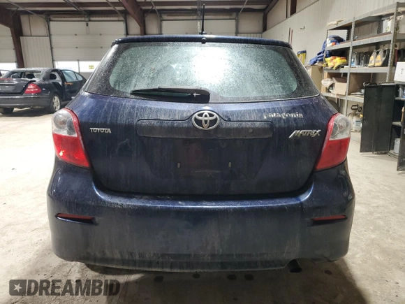 2009 Toyota Matrix with VIN 2T1KU40E89C089965, listed as a Copart auction lot 43244975 with 216,931 mi miles and Salvage Title. Bid and sale history available at DreamBid. Image 6.