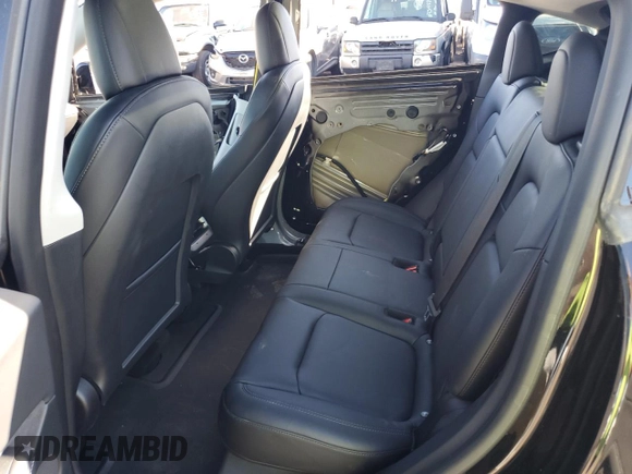 2022 Tesla Model Y Long Range z VIN 7SAYGDEE2NF391349, wystawiony jako Copart lot #85351924 z przebiegiem 5 670 mil mil oraz Szkoda całkowita • Salvage title. Historia ofert i sprzedaży dostępna na DreamBid. Obrazek 11.