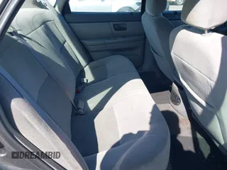 2005 Ford Taurus SE with VIN 1FAFP53U95A289971, listed as a IAAI auction lot 42143134 with 167,702 mi miles. Bid and sale history available at carsss.com. Image 8.