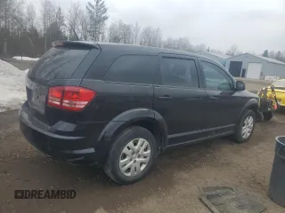 2015 Dodge Journey American Value with VIN 3C4PDCAB3FT520452, listed as a Copart auction lot 52591255 with 299,871 mi miles and Clean Title. Bid and sale history available at DreamBid. Image 3.
