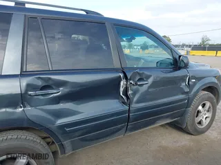 2006 Honda Pilot EX-L with VIN 2HKYF18536H538744, listed as a IAAI auction lot 42025277 with 203,012 mi miles. Bid and sale history available at carsss.com. Image 6.