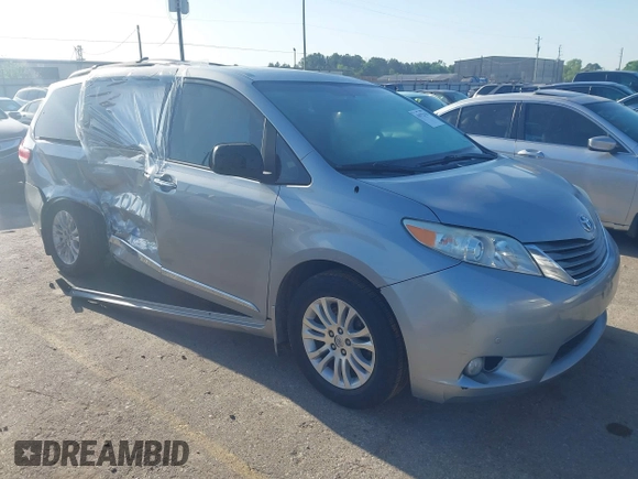 2014 Toyota Sienna XLE with VIN 5TDYK3DC8ES423450, listed as a IAAI auction lot 41972128 with 145,374 mi miles. Bid and sale history available at carsss.com. Image 1.