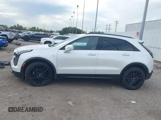 2019 Cadillac XT4 FWD Sport with VIN 1GYFZER45KF224300, listed as a IAAI auction lot 40949318 with 57,705 mi miles. Bid and sale history available at carsss.com. Image 14.