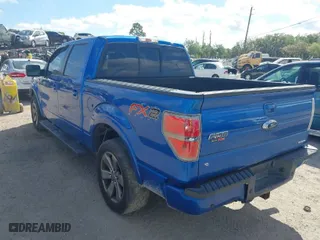 2013 Ford F-150 XL with VIN 1FTFW1CF2DFD94327, listed as a IAAI auction lot 41817344 with 292,491 mi miles. Bid and sale history available at carsss.com. Image 3.